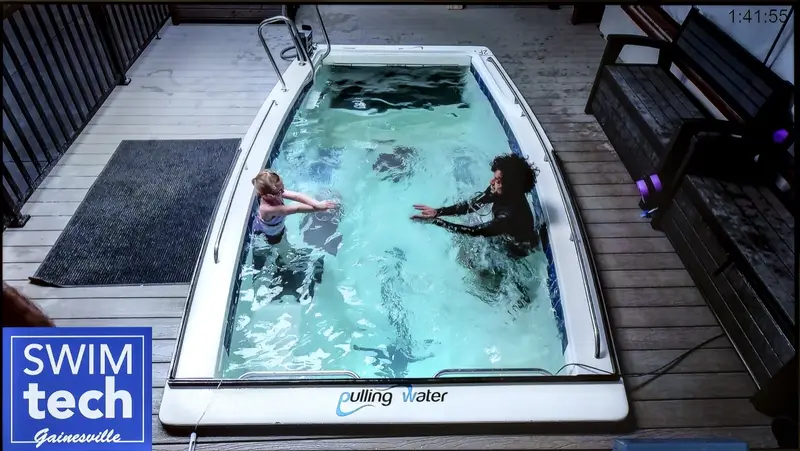 The overhead camera view of a lesson in one of SwimTec Gainesville’s Endless-style pools